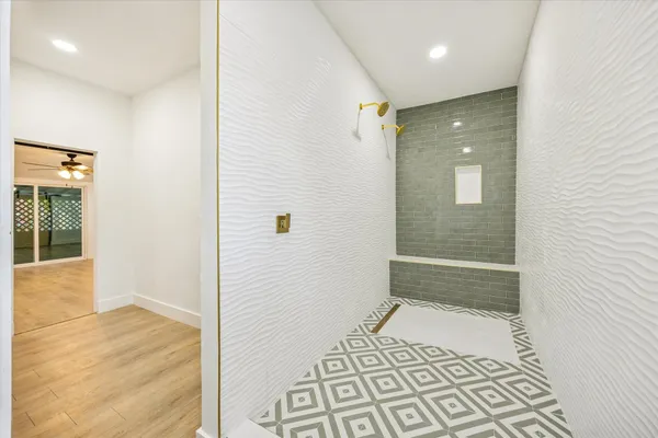 a bathroom with a shower and a toilet