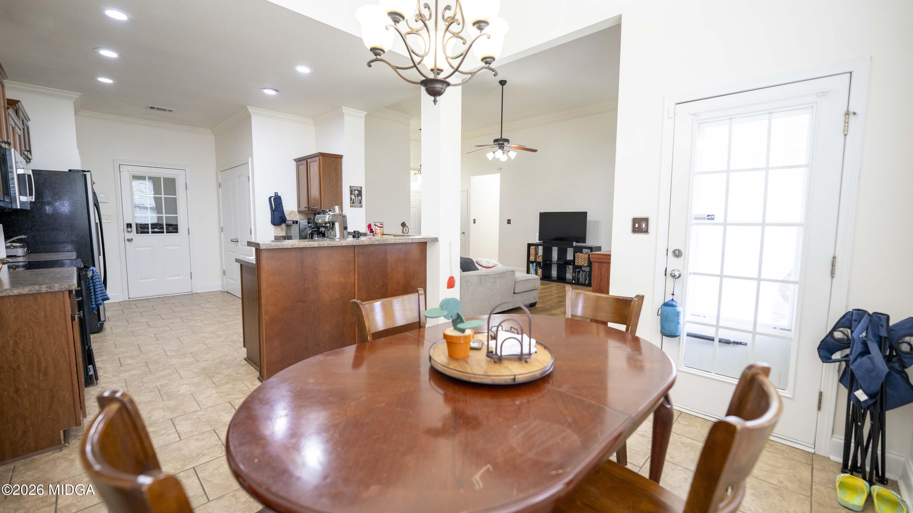 207 Broderick Circle Warner Robins, GA 31088 - Photo 13 of 33 a view of a dining room with furniture