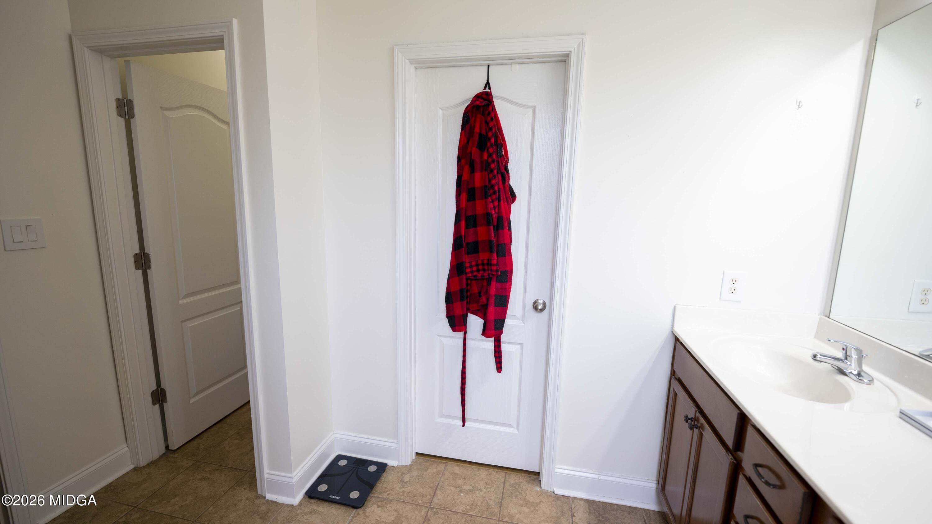 207 Broderick Circle Warner Robins, GA 31088 - Photo 26 of 33 a view of a room with shower and a sink