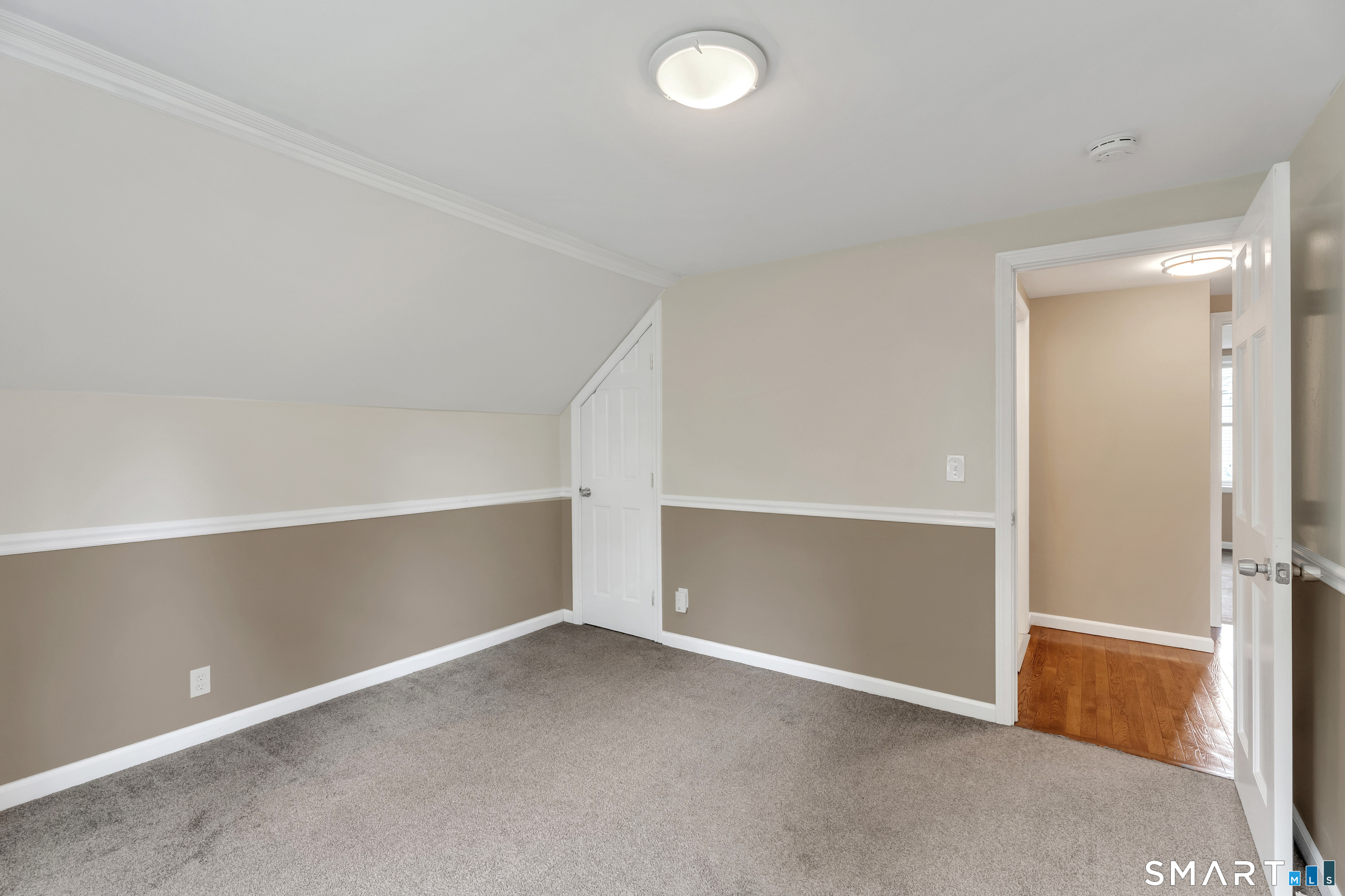 75 Summit Street Norwich, CT 06360 - Photo 26 of 40 an empty room with shelves