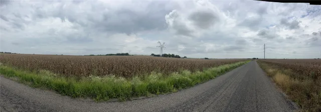 a view of a lake with a yard