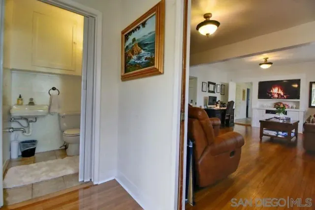 a living room with furniture and a table