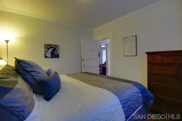 a bed room with a bed and closet