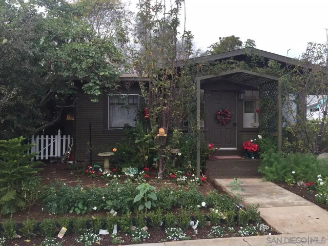 front view of house with a yard