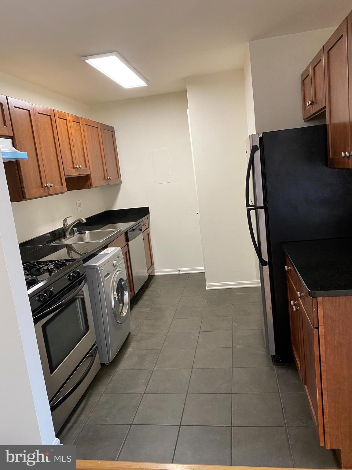 3105 Naylor Road Southeast, Unit 202 Washington, DC 20020 - Photo 3 of 13 Kitchen with new appliances