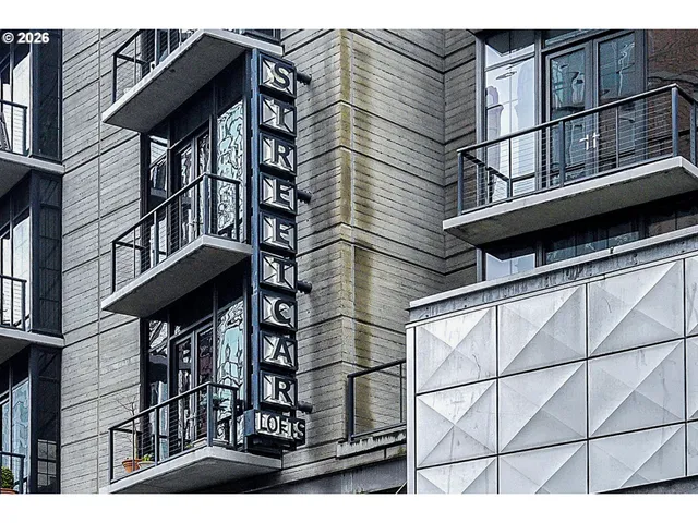 a view of a city with tall buildings in the background