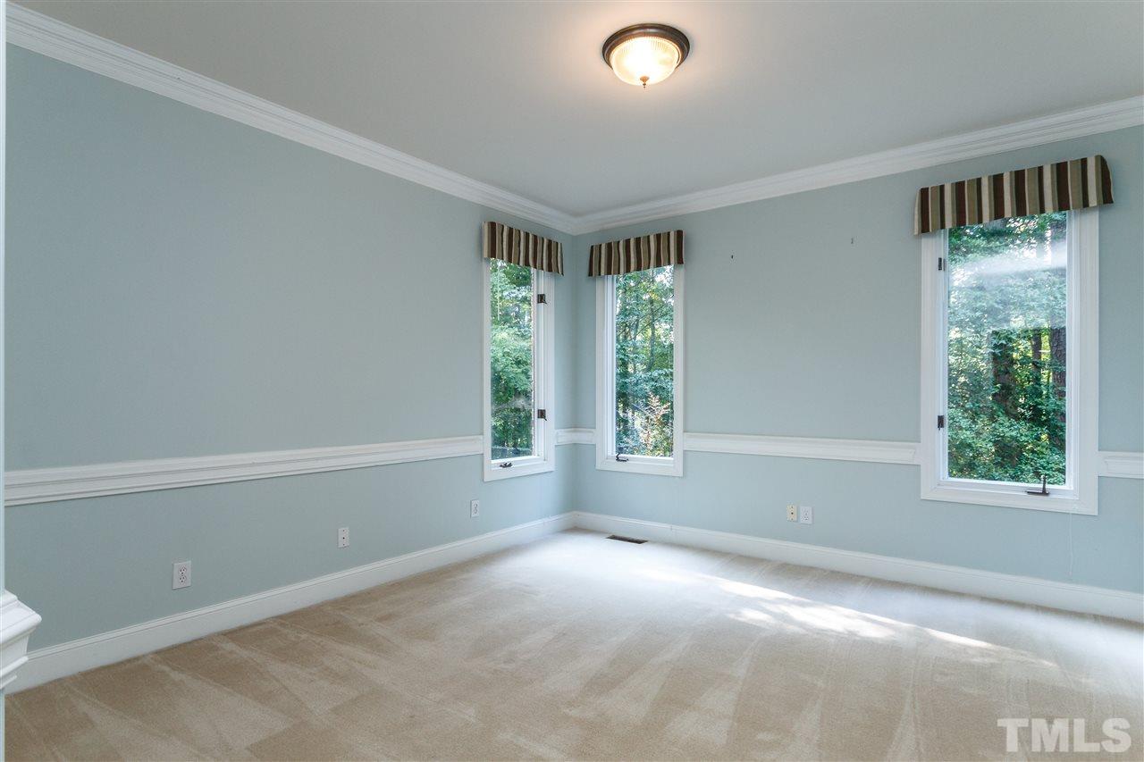 644 Pendleton Lake Road Raleigh, NC 27614 - Photo 13 of 25 an empty room with windows