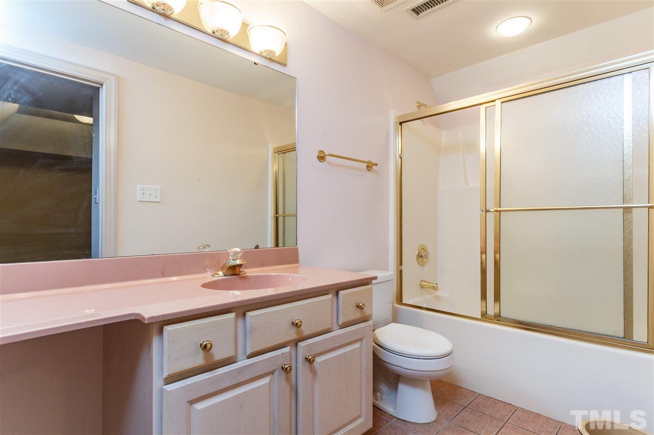 644 Pendleton Lake Road Raleigh, NC 27614 - Photo 18 of 25 a bathroom with a sink toilet and shower