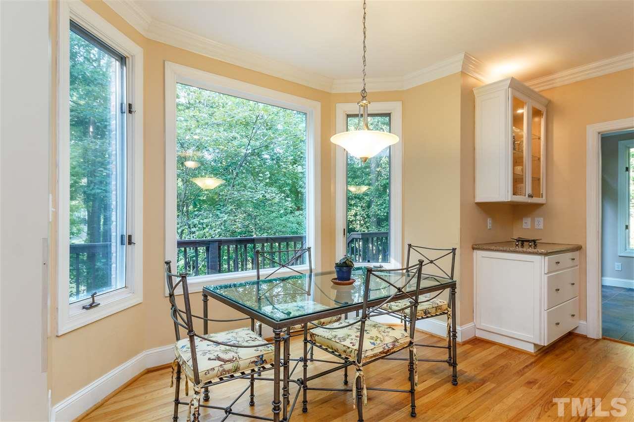 644 Pendleton Lake Road Raleigh, NC 27614 - Photo 10 of 25 a view of a dining room with furniture window and outside view