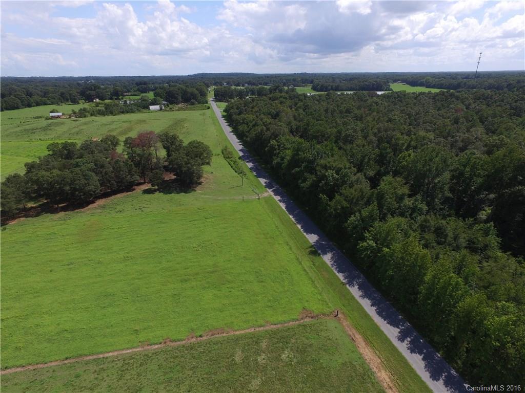 908 Price Tucker Road Monroe, NC 28110 - Photo 11 of 14 a view of a field with an ocean