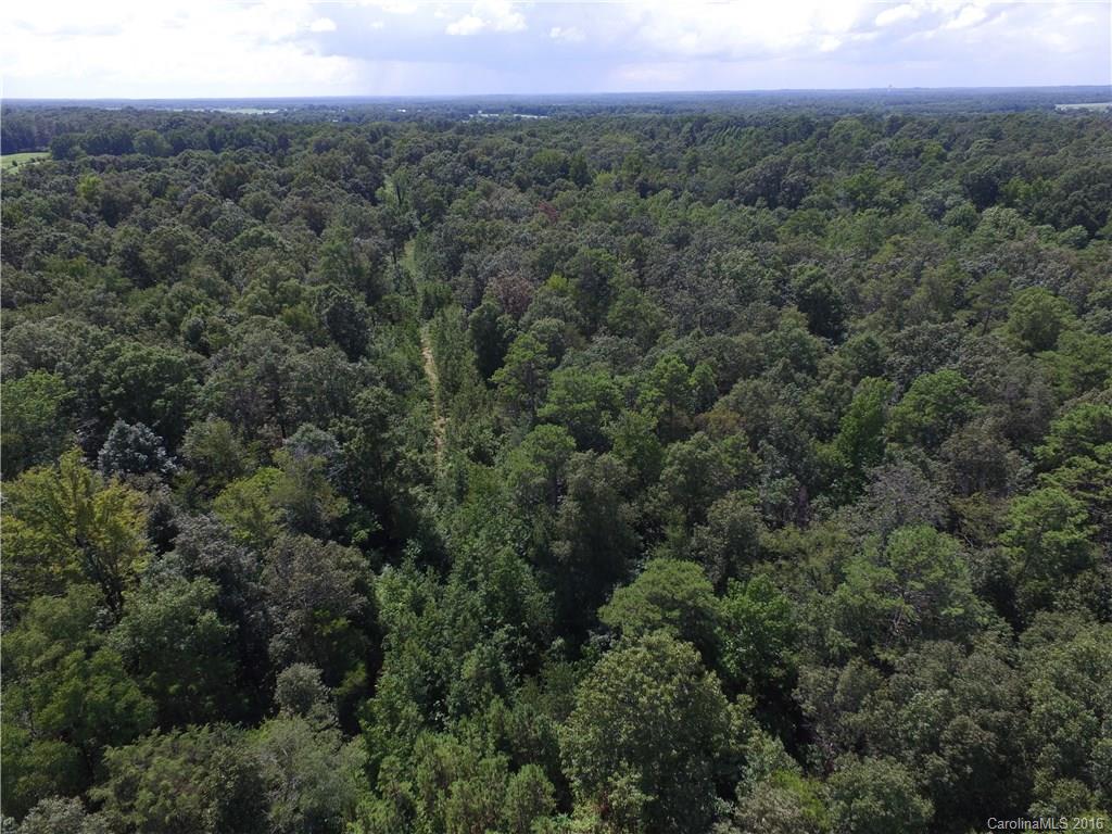 908 Price Tucker Road Monroe, NC 28110 - Photo 14 of 14 a view of a city with lush green forest