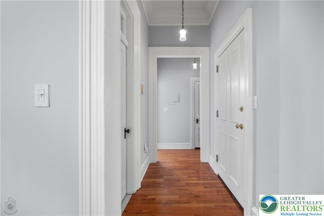 101 Northampton Street, Unit 2 Easton, PA 18042 - Photo 11 of 26 a view of a hallway with a wooden door