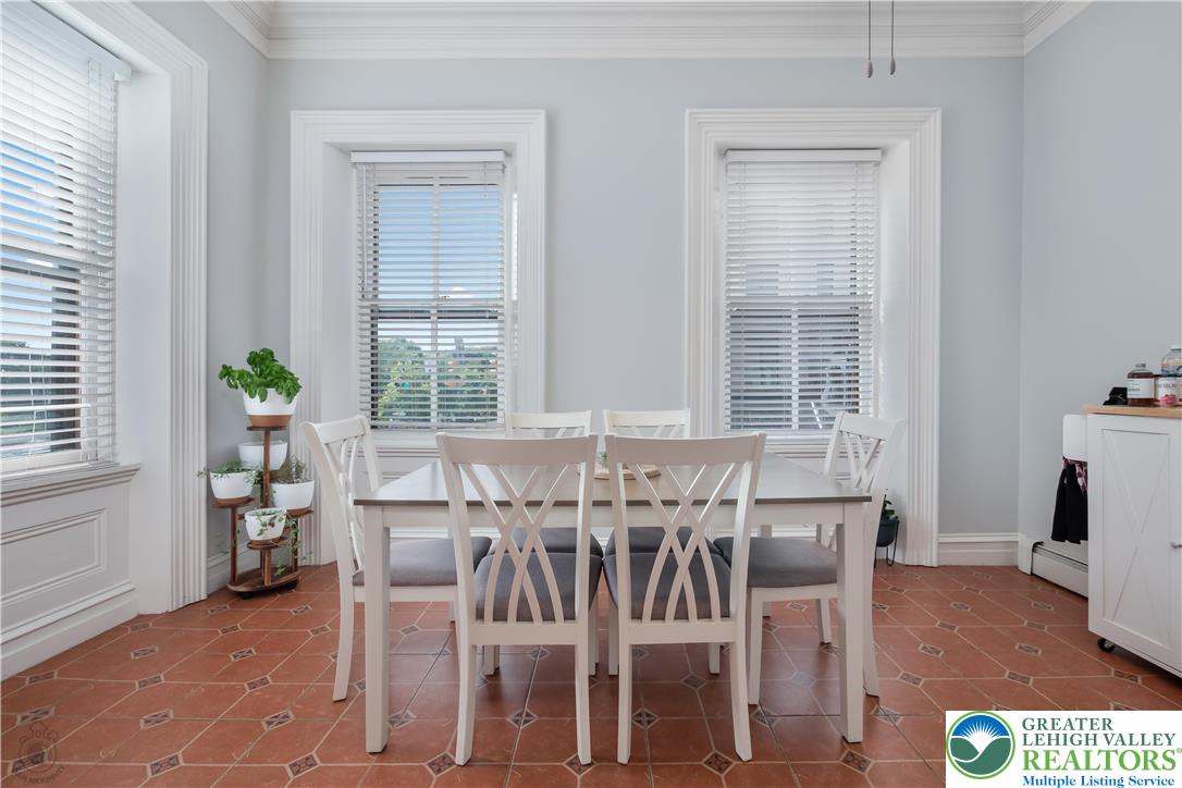 101 Northampton Street, Unit 2 Easton, PA 18042 - Photo 14 of 26 a view of a dining room with furniture and wooden floor