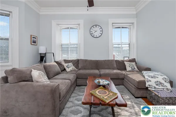 a view of a hallway with a wooden door
