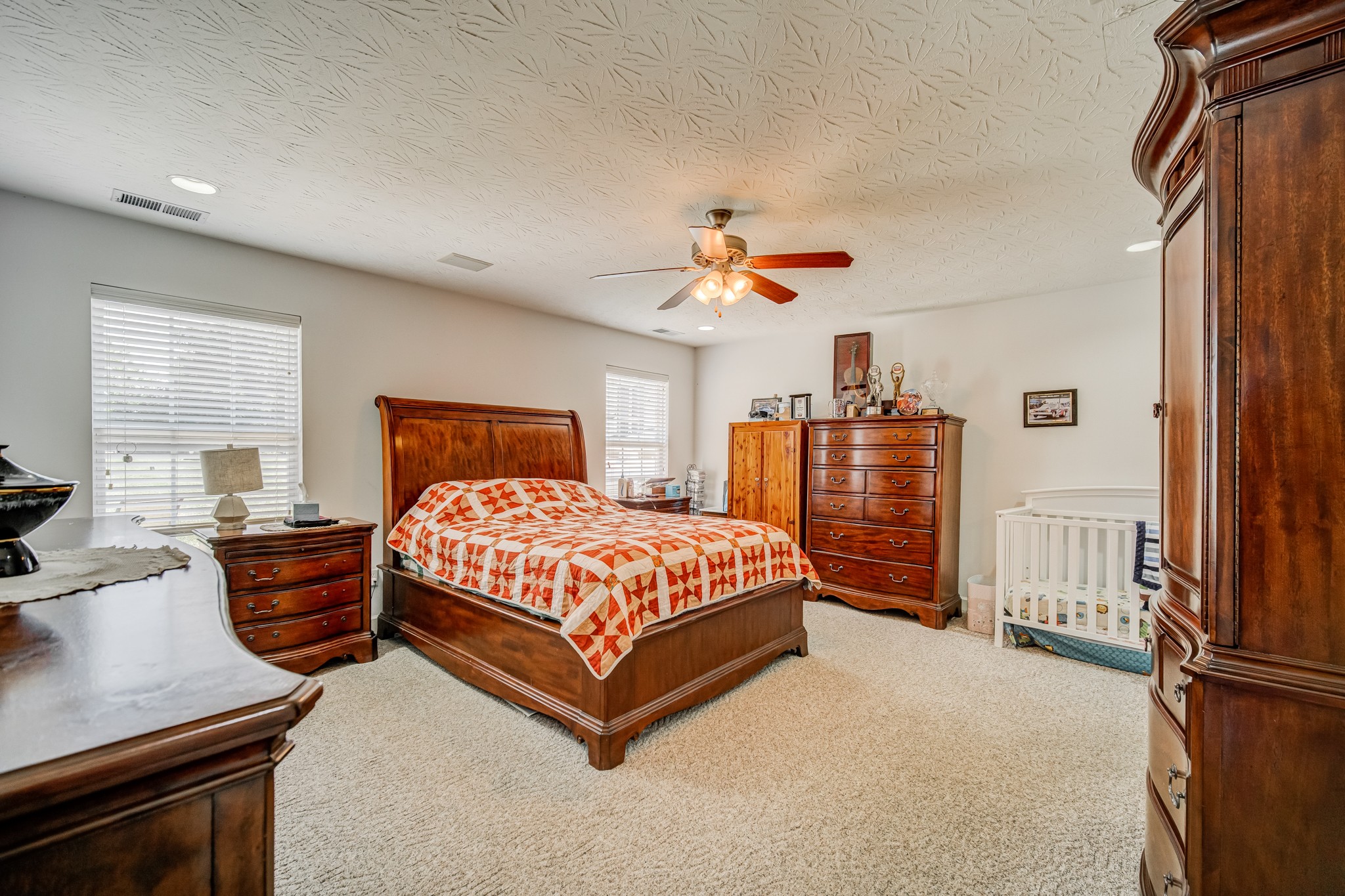 408 Cook Road Portland, TN 37148 - Photo 16 of 16 a bedroom with a bed dresser and a window