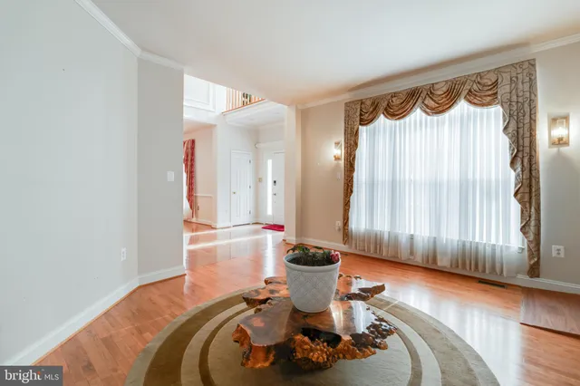 a view of a living room and dining room