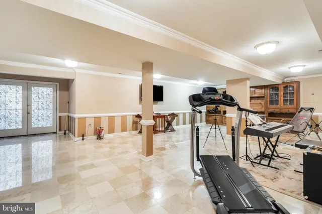 an aerial view of a house with yard swimming pool and outdoor seating
