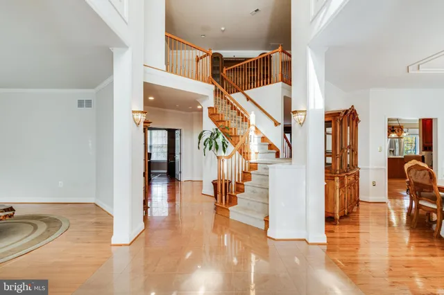 a bedroom with a bed and a chair