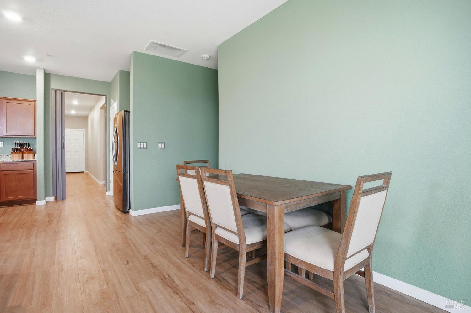 4640 Orchard Lane Rio Vista, CA 94571 - Photo 12 of 31 a view of a dining room with furniture and wooden floor