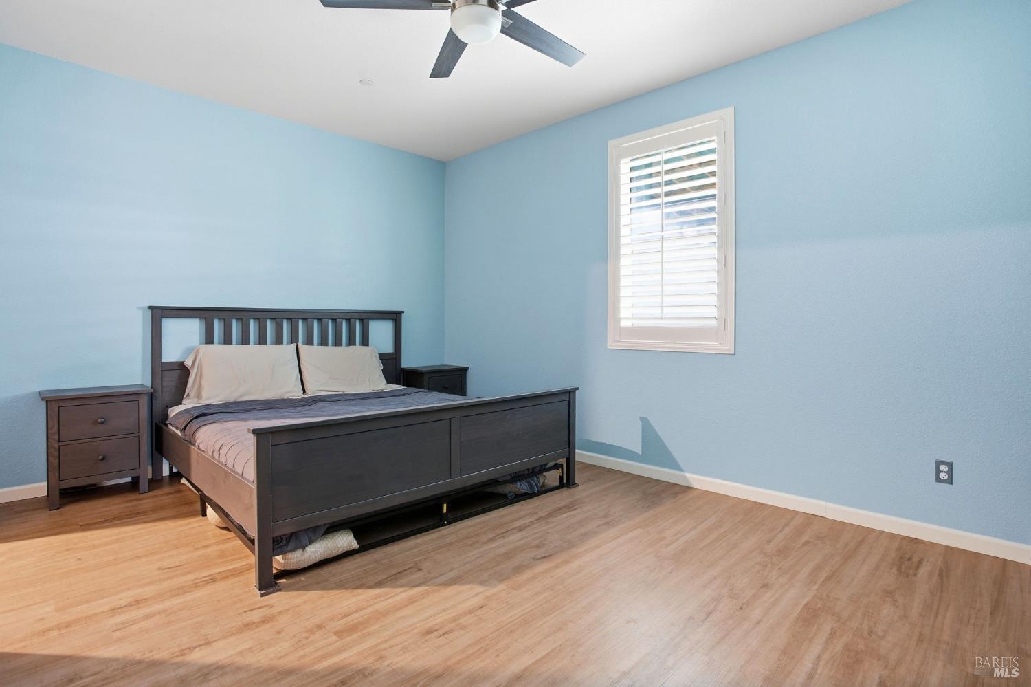 4640 Orchard Lane Rio Vista, CA 94571 - Photo 13 of 31 a spacious bedroom with a bed and window