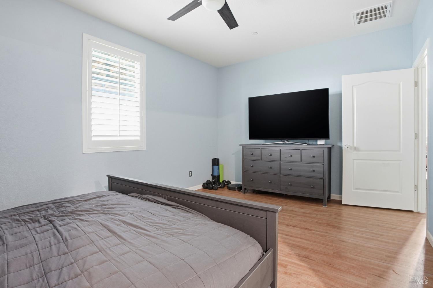 4640 Orchard Lane Rio Vista, CA 94571 - Photo 14 of 31 a bedroom with a bed and a flat screen tv