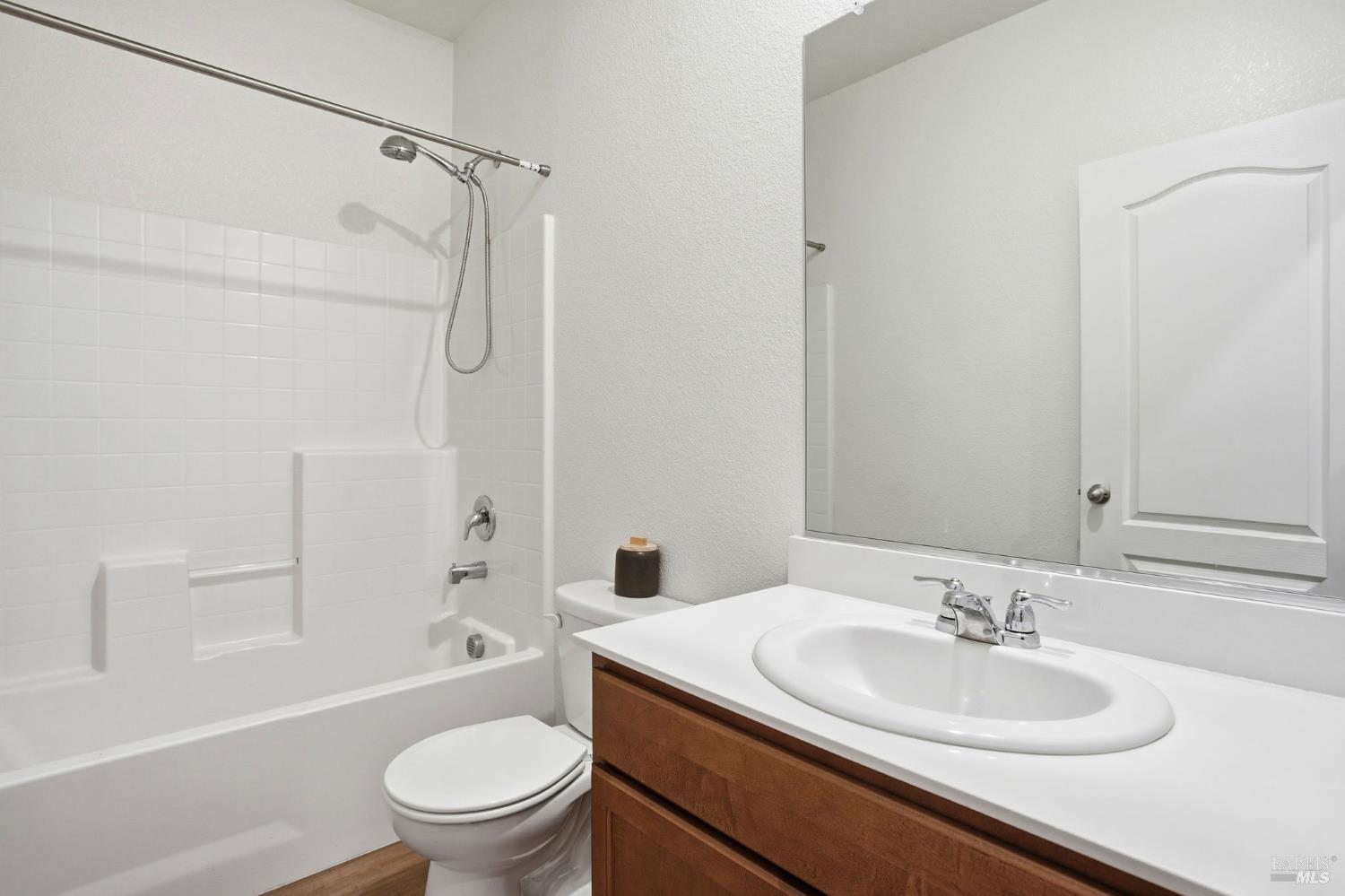 4640 Orchard Lane Rio Vista, CA 94571 - Photo 21 of 31 a bathroom with a sink a toilet and a bathtub