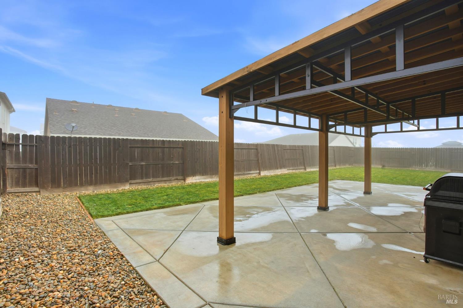 4640 Orchard Lane Rio Vista, CA 94571 - Photo 26 of 31 a view of a backyard with floor to ceiling windows