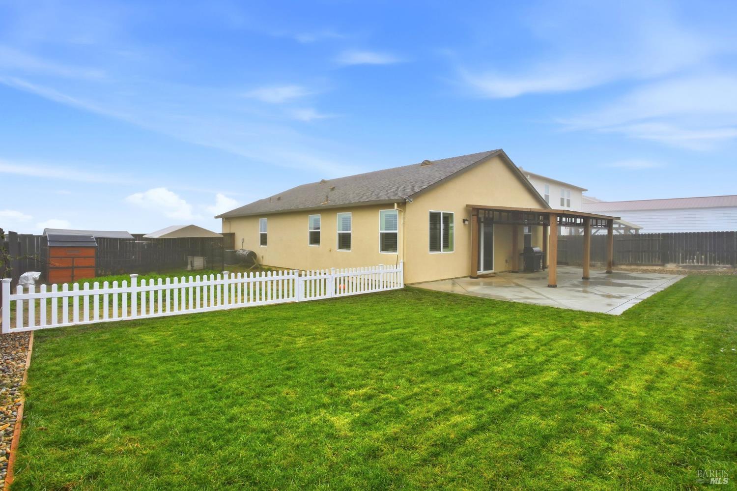 4640 Orchard Lane Rio Vista, CA 94571 - Photo 28 of 31 a view of a house with a yard and deck