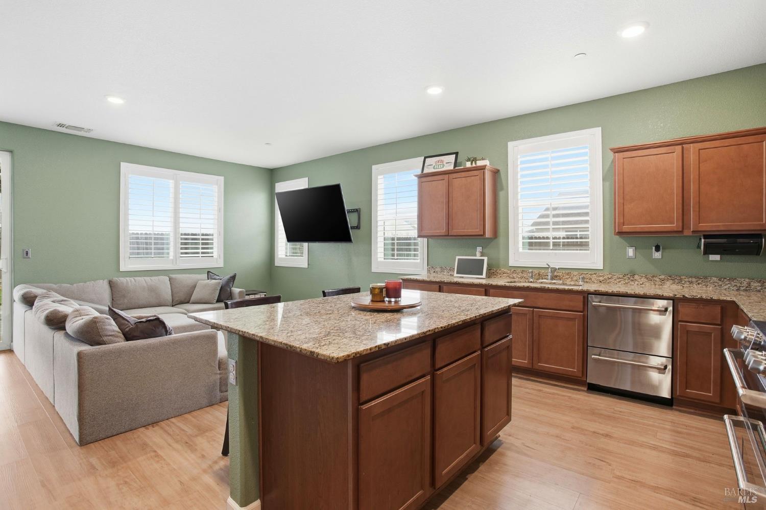 4640 Orchard Lane Rio Vista, CA 94571 - Photo 5 of 31 a kitchen with a stove a sink and a refrigerator