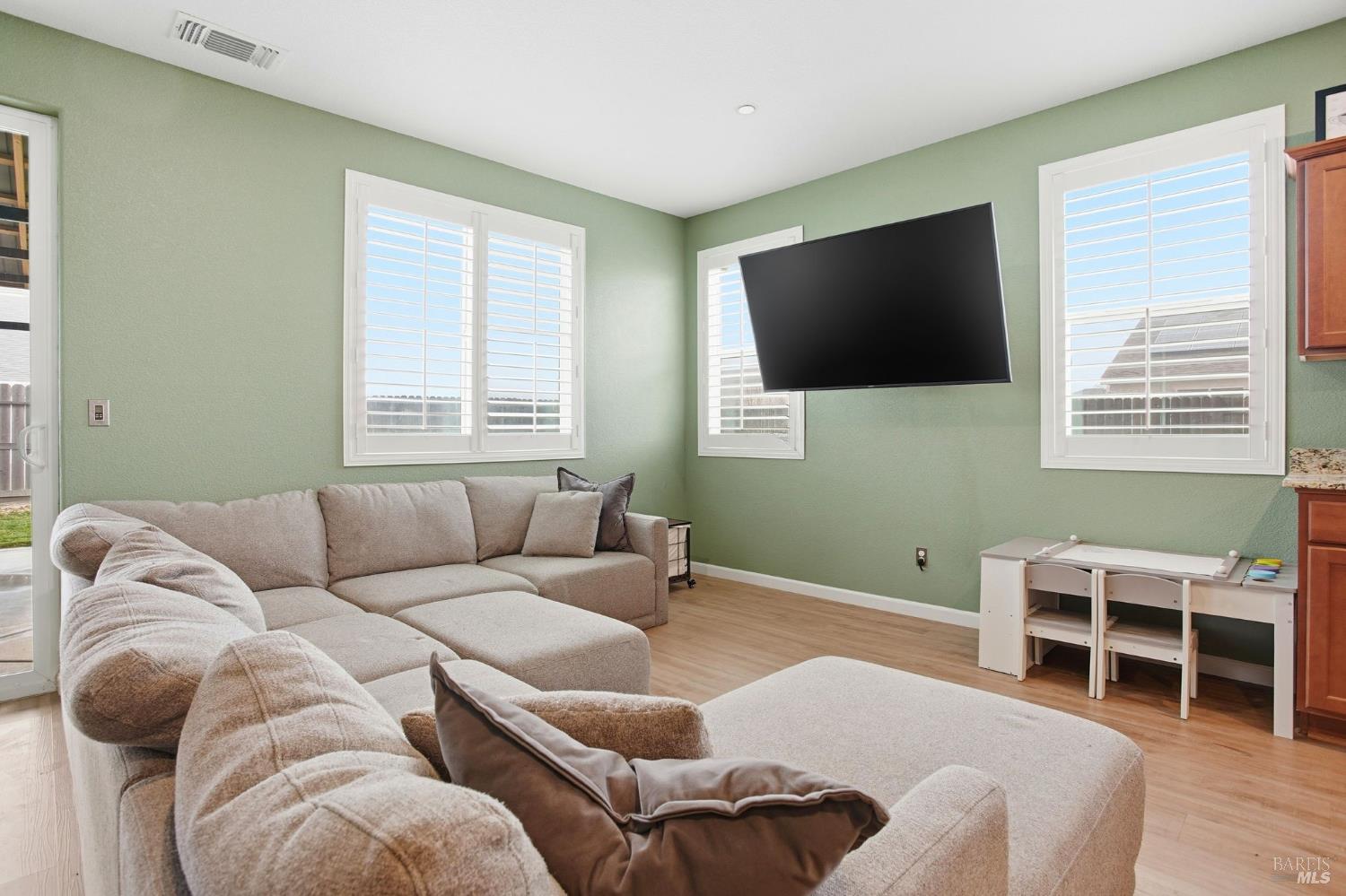 4640 Orchard Lane Rio Vista, CA 94571 - Photo 7 of 31 a living room with furniture and a flat screen tv