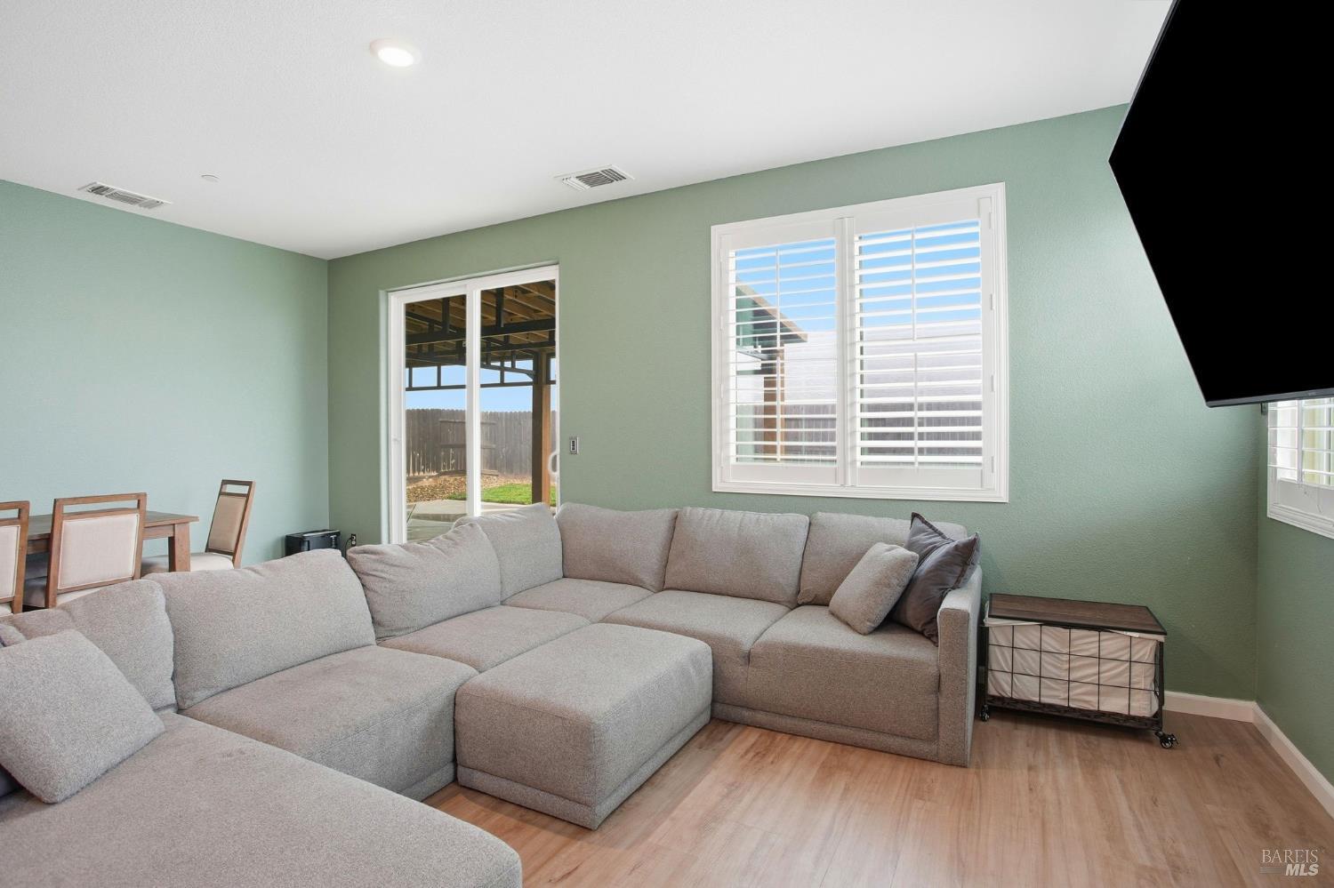 4640 Orchard Lane Rio Vista, CA 94571 - Photo 8 of 31 a living room with furniture and a flat screen tv