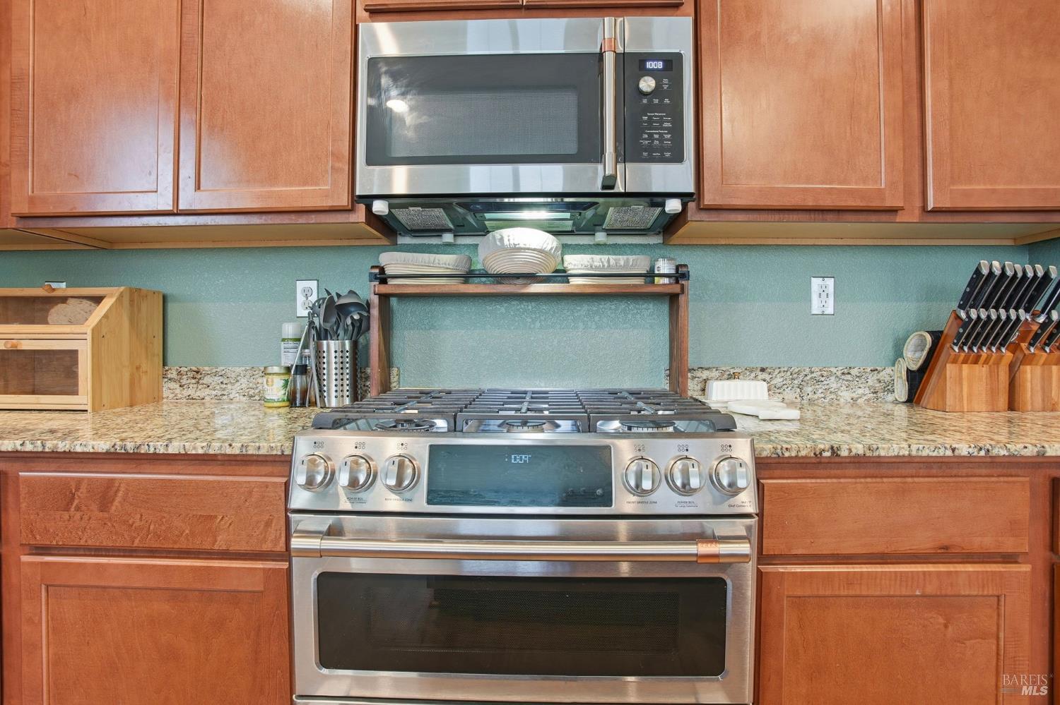 4640 Orchard Lane Rio Vista, CA 94571 - Photo 10 of 31 a stove top oven sitting inside of a kitchen