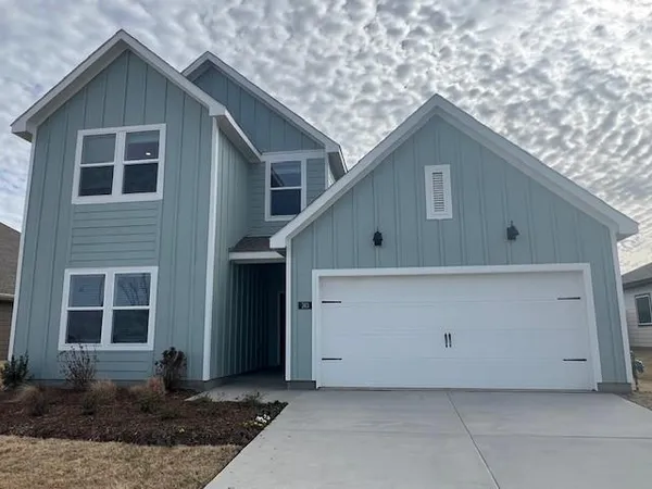 a house view with a backyard space