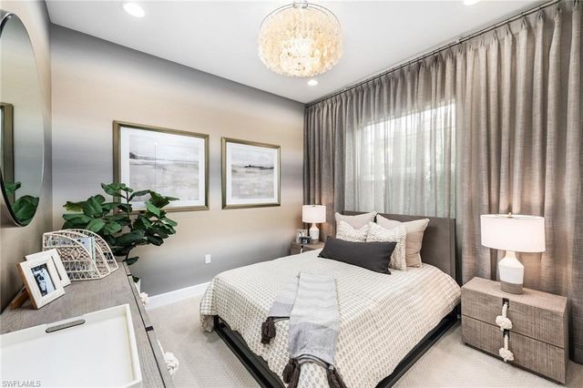 a view of a street with a building in the background