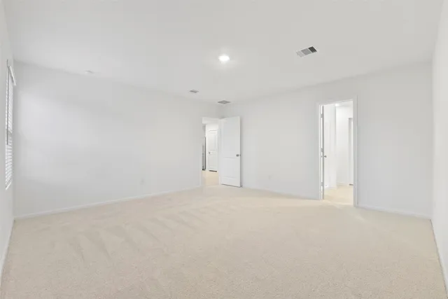 an empty room with an entryway