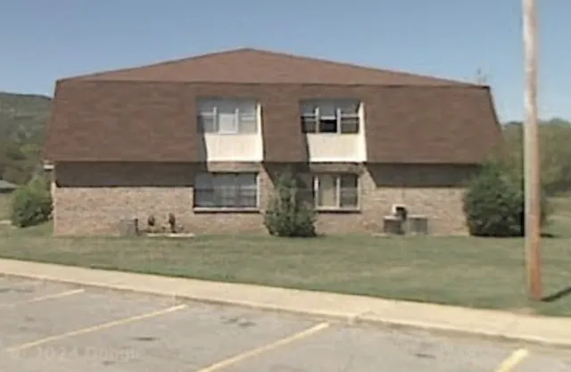 a front view of house with yard