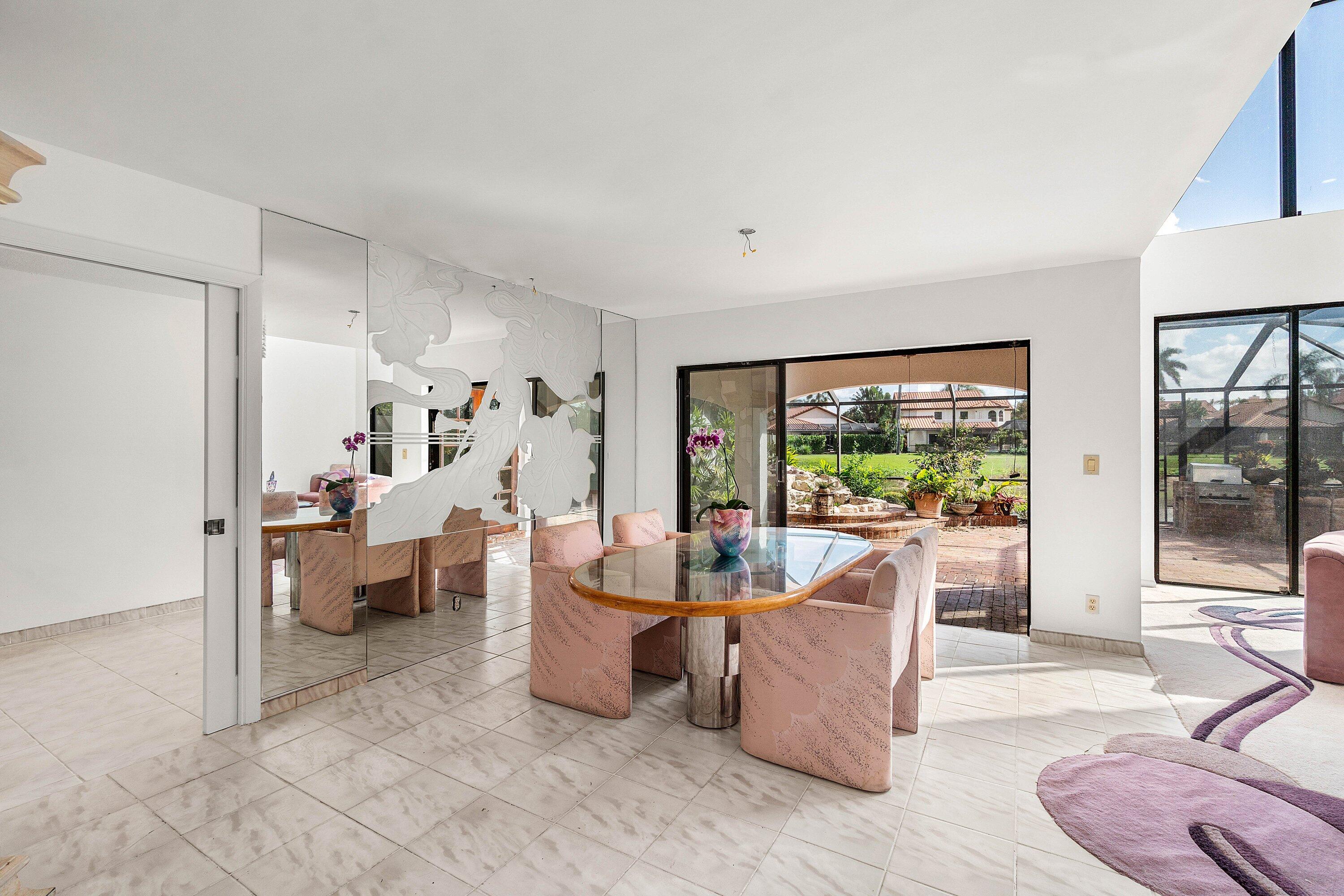 22640 Caravelle Circle Boca Raton, FL 33433 - Photo 14 of 37 a living room with furniture and a large window
