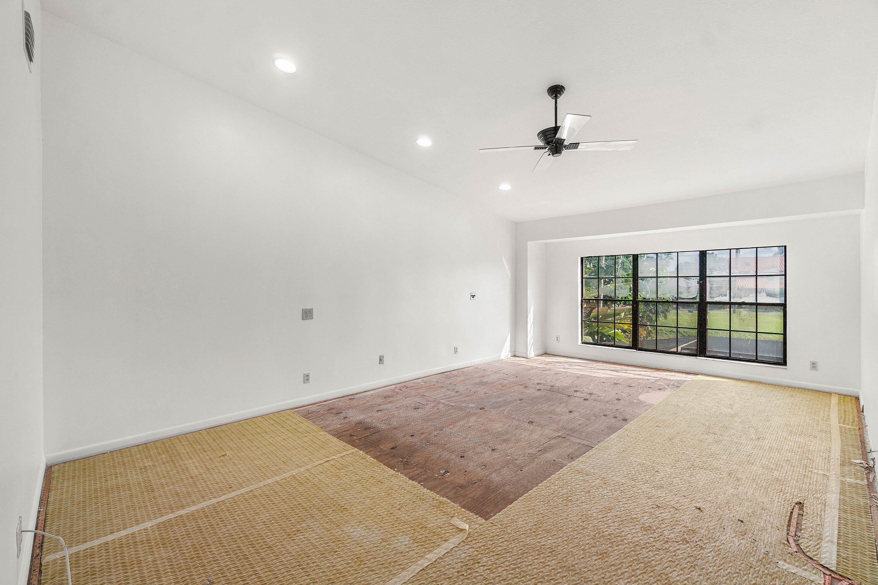 22640 Caravelle Circle Boca Raton, FL 33433 - Photo 19 of 37 a view of an empty room with a window