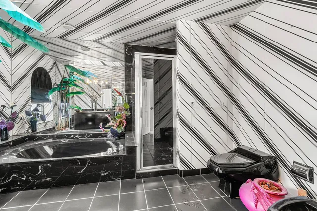 a kitchen with a sink and a stove