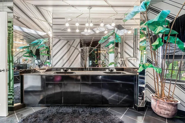 a view of a livingroom with furniture and windows