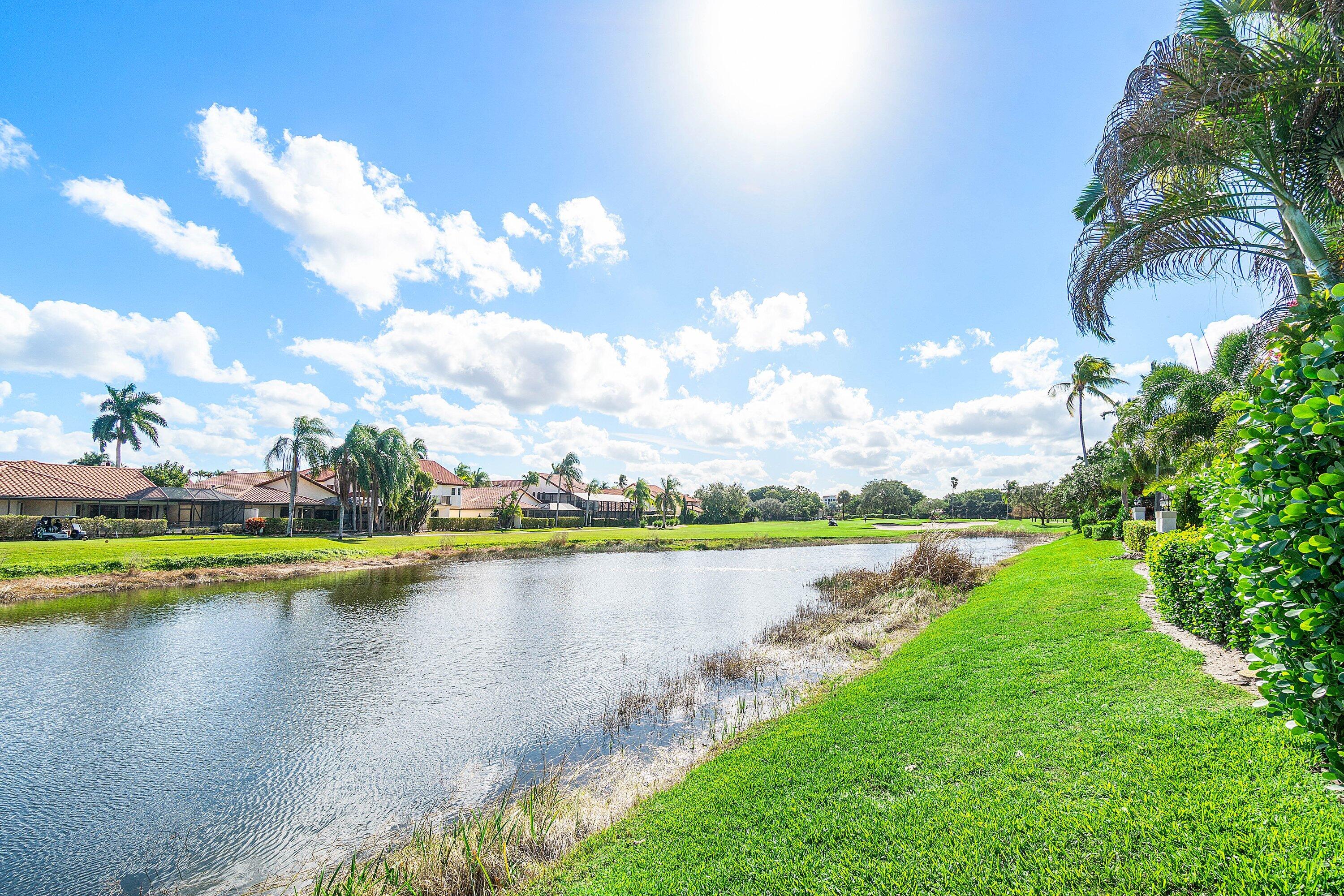 22640 Caravelle Circle Boca Raton, FL 33433 - Photo 37 of 37 a view of a lake with houses in the back