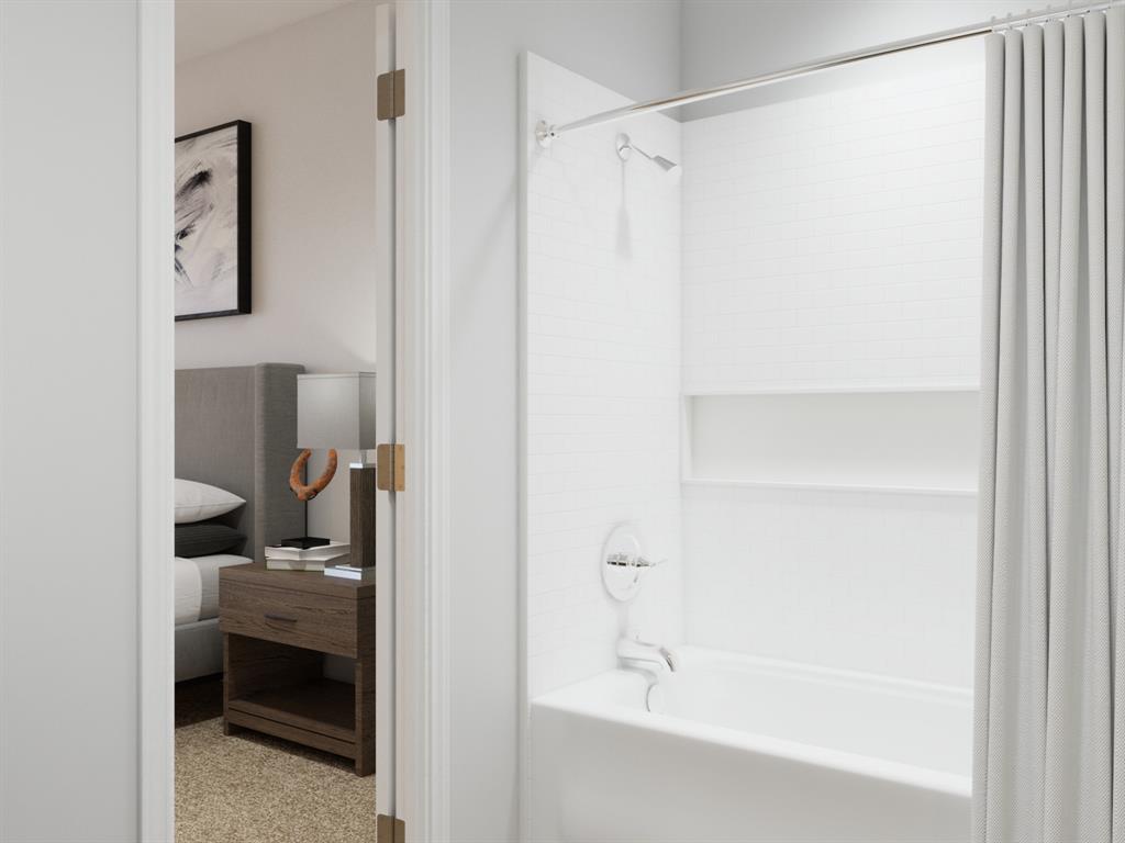 10608 Brocket Lane Crowley, TX 76036 - Photo 32 of 40 a en suite bathroom with a sink and a shower