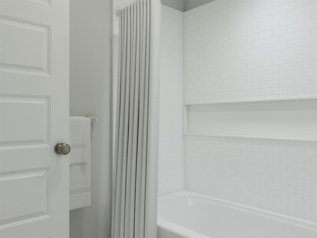 10608 Brocket Lane Crowley, TX 76036 - Photo 40 of 40 a close up of a bathtub with a white shower