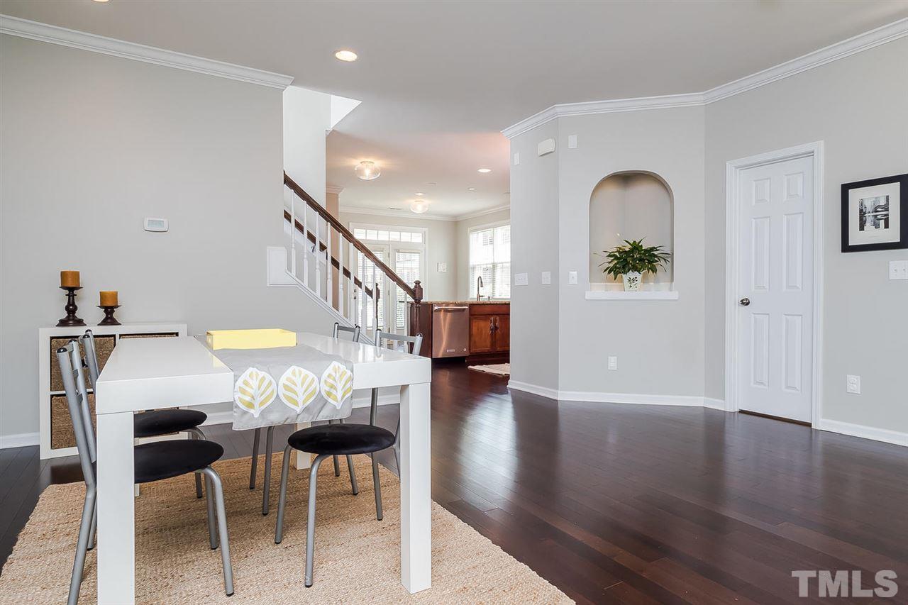 1369 Regulator Street Raleigh, NC 27603 - Photo 7 of 22 a view of livingroom with furniture and wooden floor