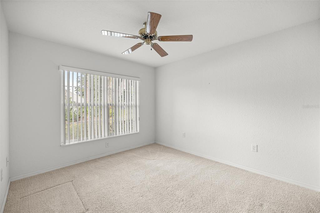 10970 Southwest 69th Circle Ocala, FL 34476 - Photo 14 of 50 a view of an empty room with a window