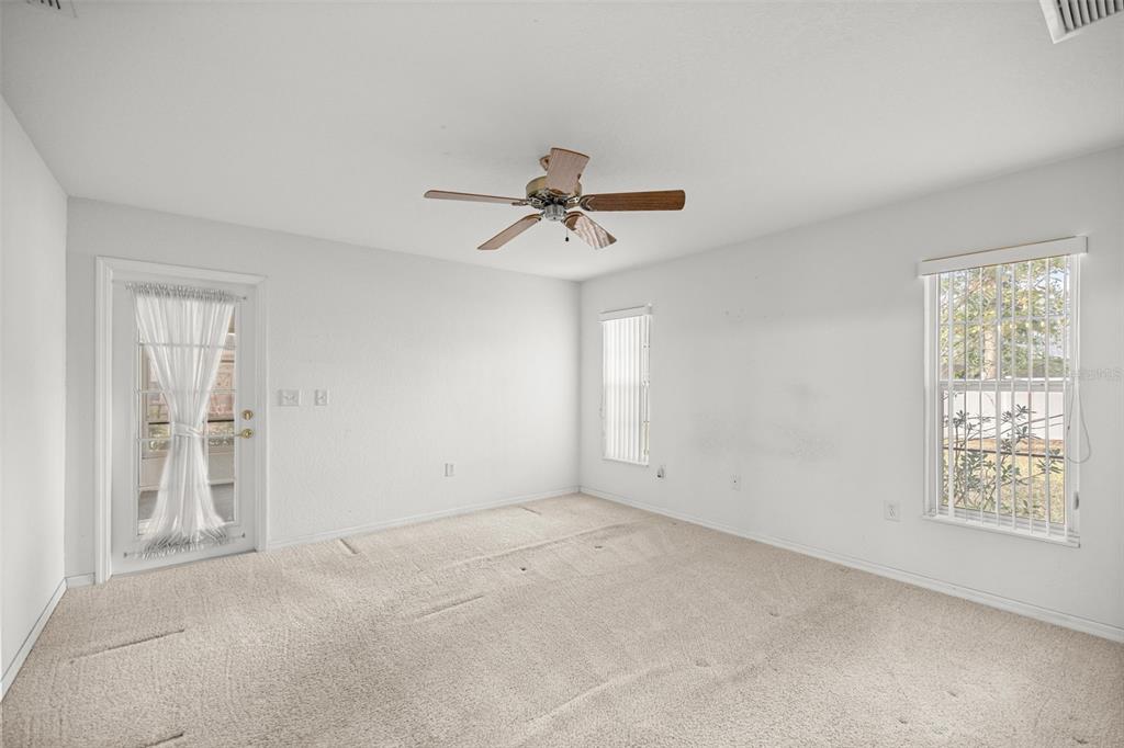 10970 Southwest 69th Circle Ocala, FL 34476 - Photo 17 of 50 a view of an empty room with a window