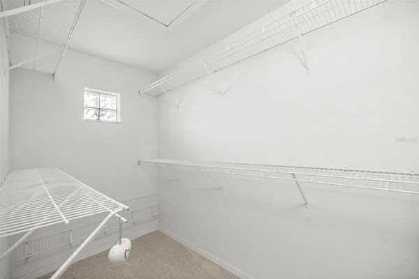a view of a room with racks on the wall