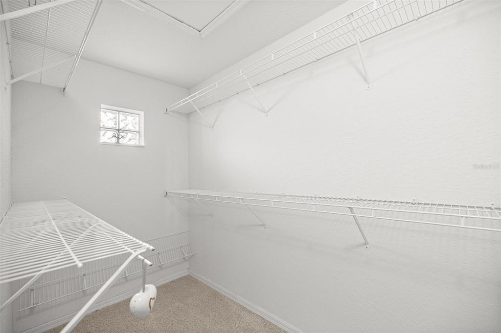 10970 Southwest 69th Circle Ocala, FL 34476 - Photo 19 of 50 a view of a room with racks on the wall
