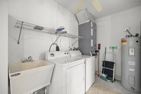 a utility room with dryer and washer