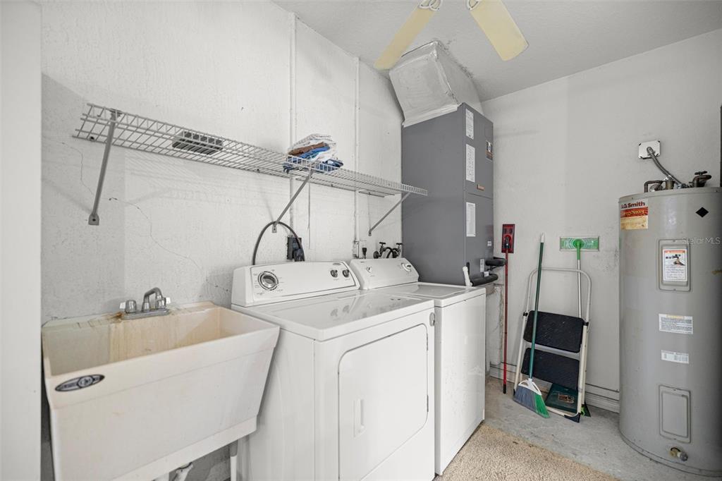 10970 Southwest 69th Circle Ocala, FL 34476 - Photo 25 of 50 a utility room with dryer and washer